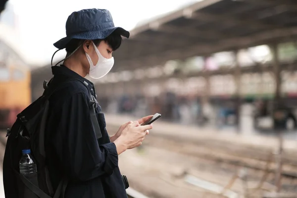 Asian Man Using Smartphone Medical Face Mask Protect Covid New — Stock Photo, Image