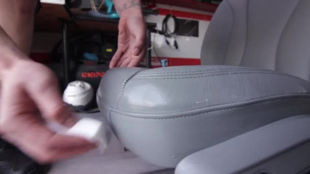Wipe and polish leather seats from dust and dirt. Professional auto cleaning Video Clip