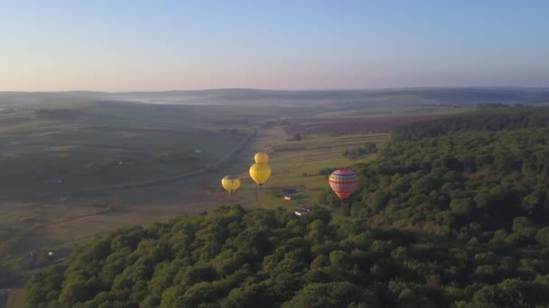 Colourful Red Blue Yellow Colours Hot Air Baloons Aerial Drone Flight Over Beautiful Autumn Forrest at Sunet Mountains Beautiful Landscape Background Sunny Vacation Travel Destination Concept Stock Footage