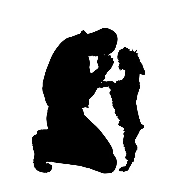 Silhouette d'homme avec un chien — Image vectorielle