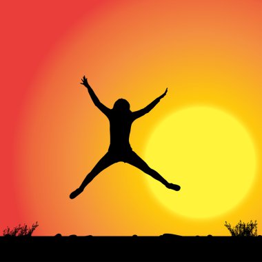 Günbatımı üzerinde dans eden kadın.