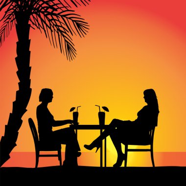 Masada oturan Çift.