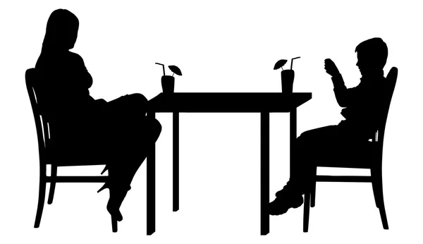 Familia sentada a la mesa . — Vector de stock