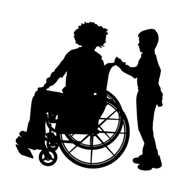 Oğlu ile tekerlekli sandalyedeki adam.