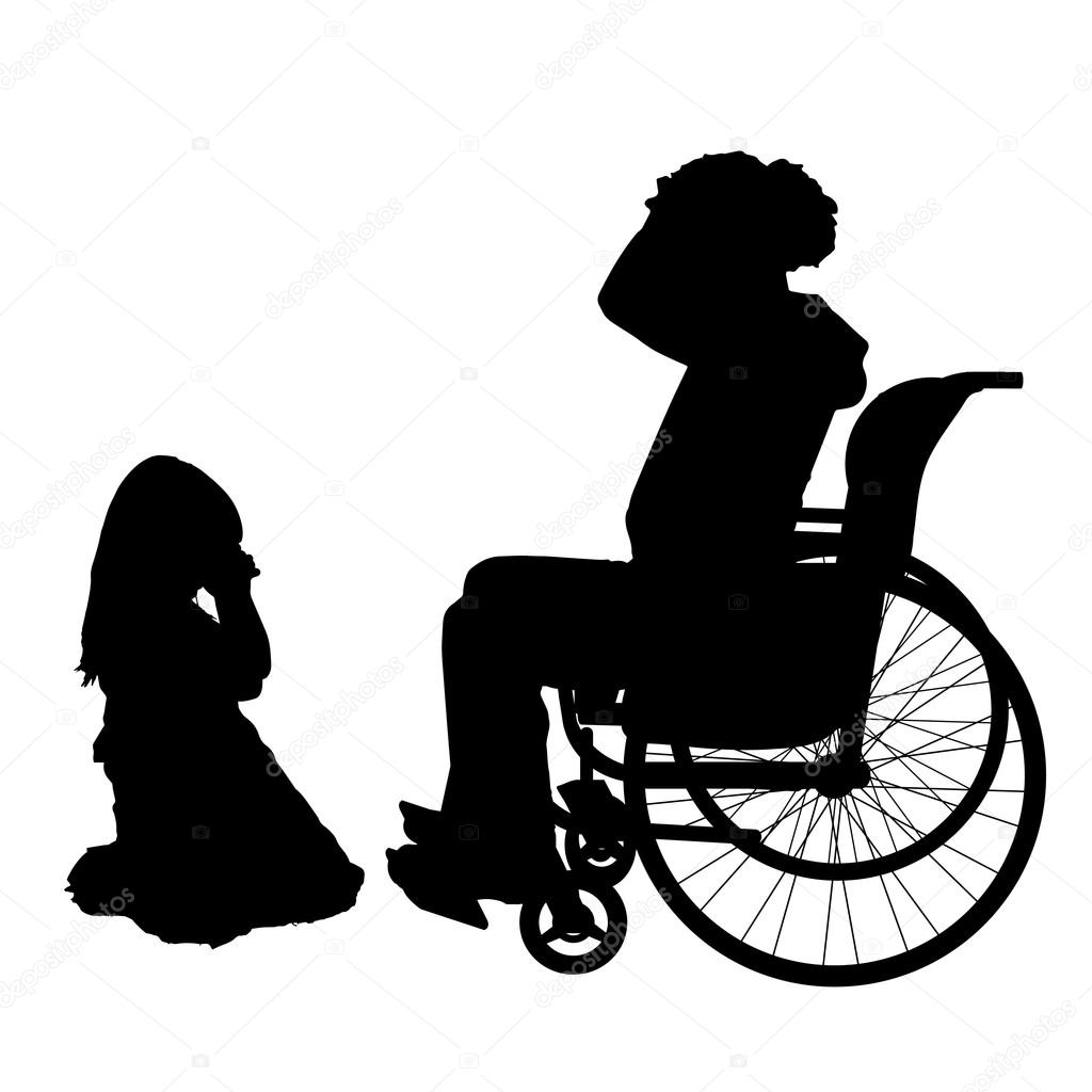 Man in wheelchair with daughter.