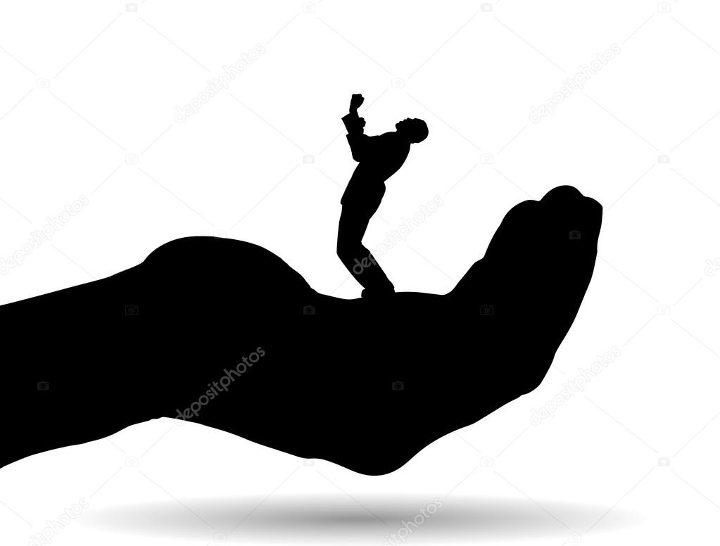 Silhouette of a man on palm