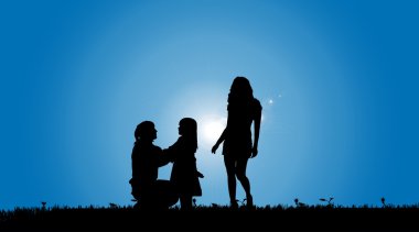 Aile bir çayırda.