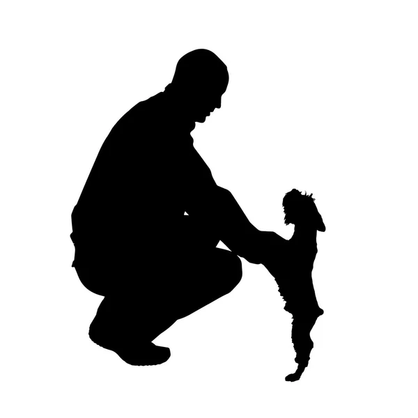 Silhouette d'homme avec un chien . — Image vectorielle