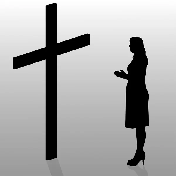 Mujer que se arrodilla cerca de la cruz . — Vector de stock