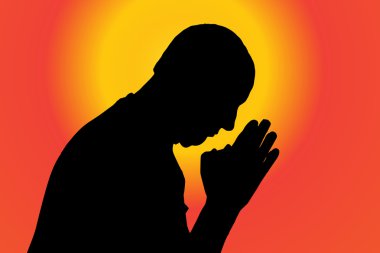 man who prays at sunset.