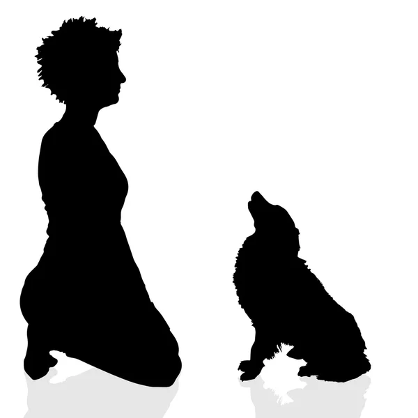 Silhouette di una donna con un cane — Vettoriale Stock