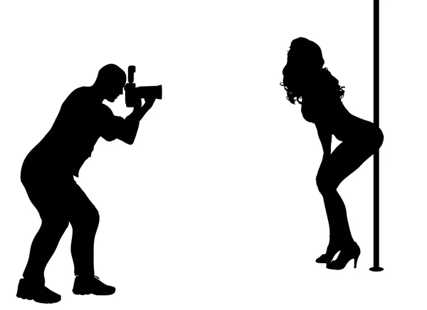 Photographer at work with sexy model. — Stock Vector