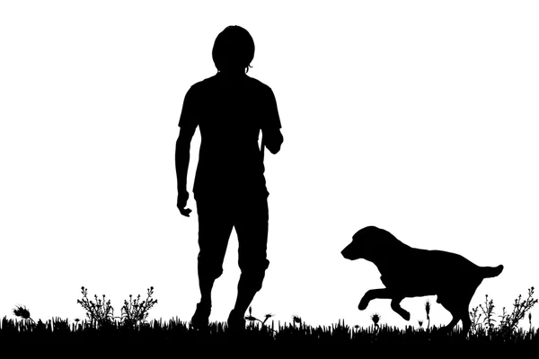 Silhouet van een man met een hond. — Stockvector