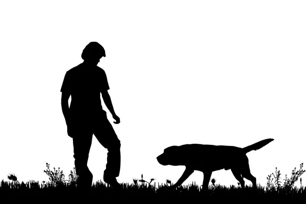 Silhouet van een man met een hond. — Stockvector