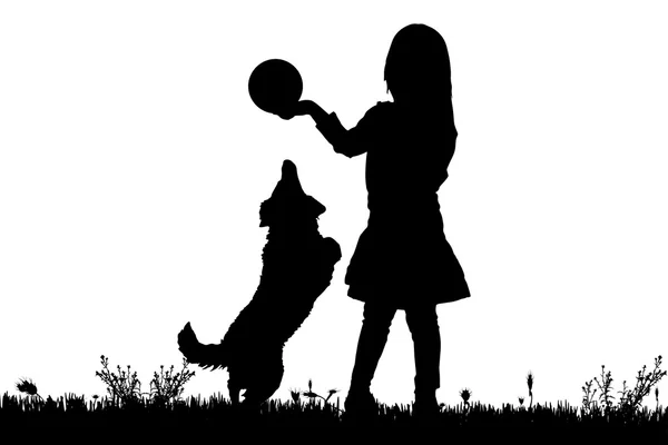 Silueta de un niño con un perro . — Vector de stock