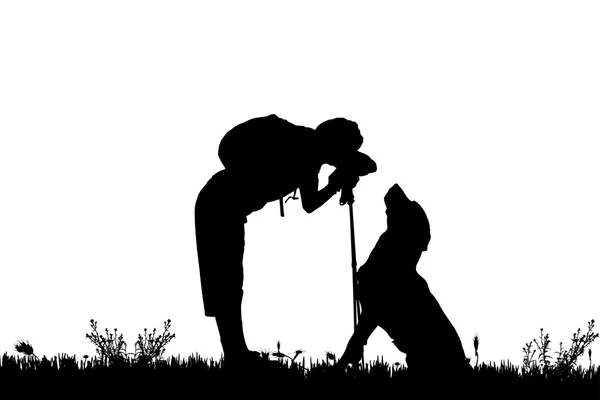 Silhouet van man met hond. — Stockvector