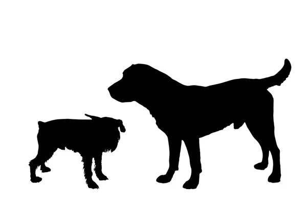 Siluetas de perros juguetones — Vector de stock