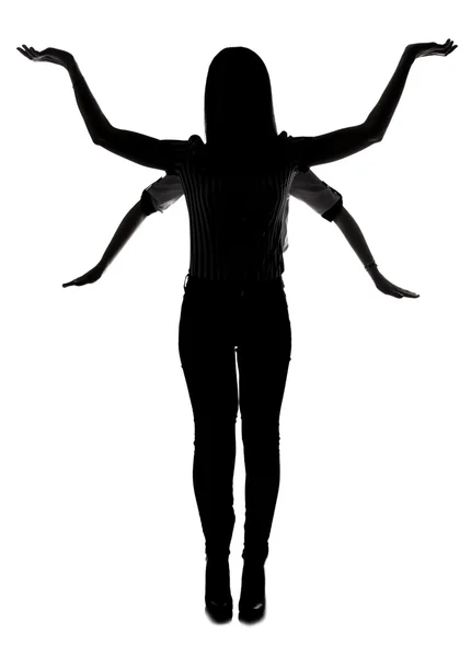 Silhouette of multi-armed woman — Stock Photo, Image