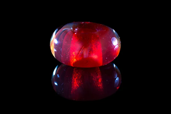 Red glassy bead with reflection — Stock Photo, Image