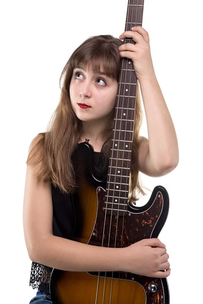 Ragazza bionda adolescente con una chitarra in mano, guardando in alto — Foto Stock