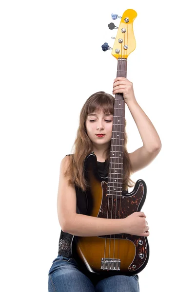 Sorridente adolescente con una chitarra in mano — Foto Stock