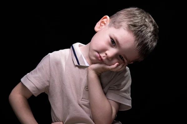 Little tired boy with hands on hips, close up — Stock Photo, Image