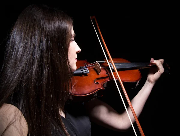 여자 뒤에서 바이올린 연주 — 스톡 사진