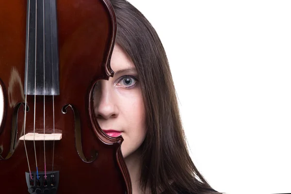 Mulher escondida atrás do violino — Fotografia de Stock