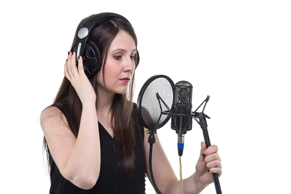 Young woman in headphones, recording of vocal — Stock Photo, Image