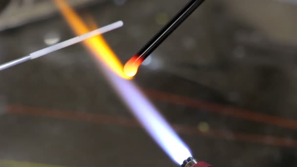 Smelting of glass stick — Stock Video