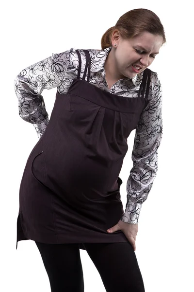 Schwangere junge Frau und Rückenschmerzen — Stockfoto