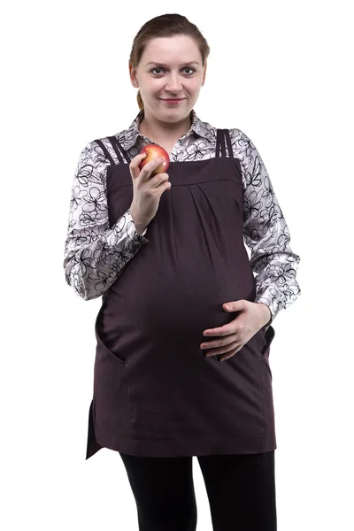 Mujer embarazada mostrando manzana — Foto de Stock