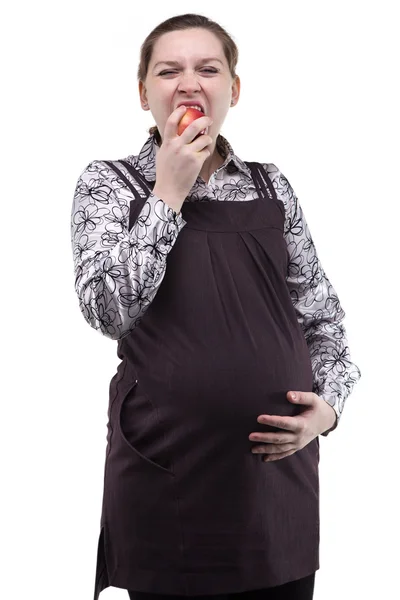 妊娠中の女性がリンゴを食べる — ストック写真