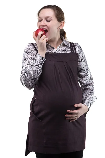 Gravid ung kvinna äta äpple — Stockfoto