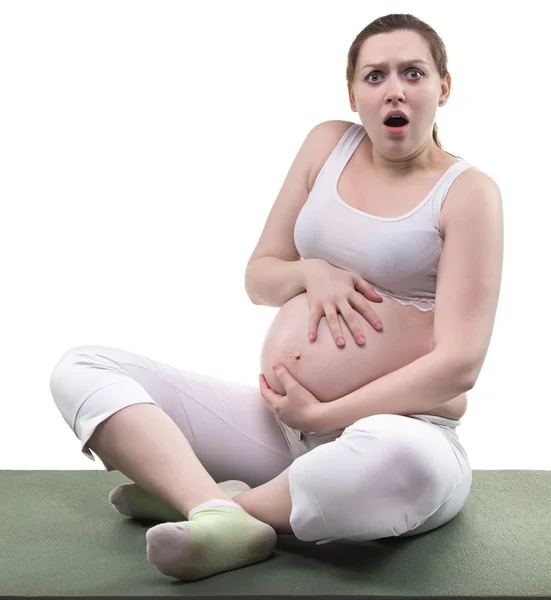 Pregnant frighted woman and beginning birth — Stock Photo, Image