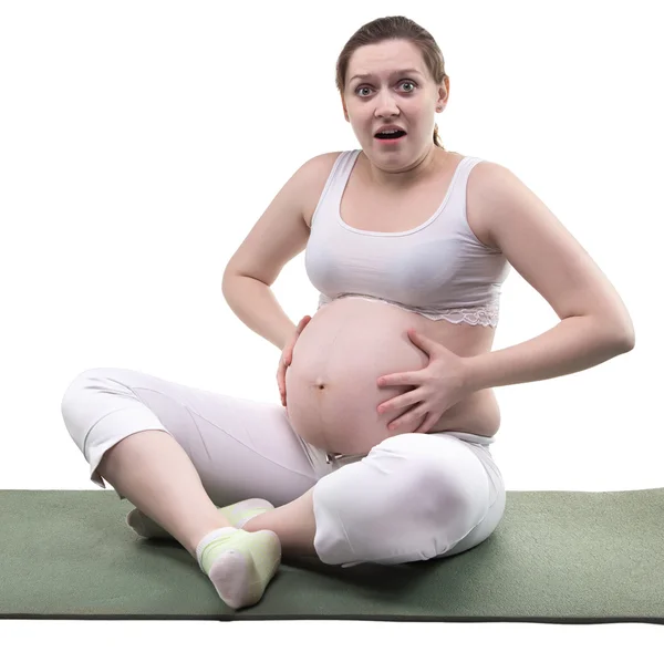 Zwangere vrouw en het begin van de geboorte — Stockfoto