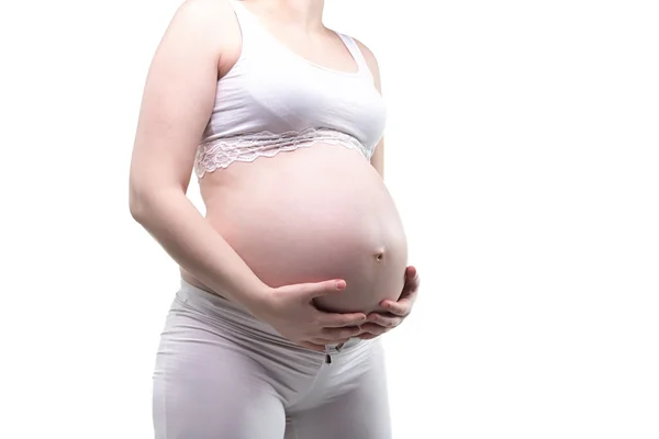 Zwangere vrouw knuffelen buik — Stockfoto