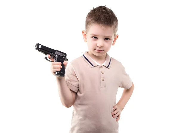 Allvarliga blond liten pojke med pistol — Stockfoto