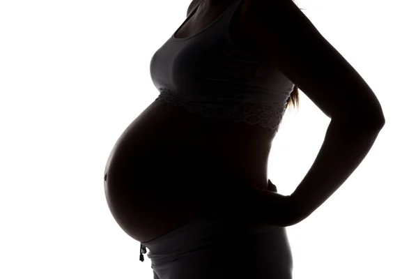 Silhouette della futura madre di profilo, senza volto — Foto Stock