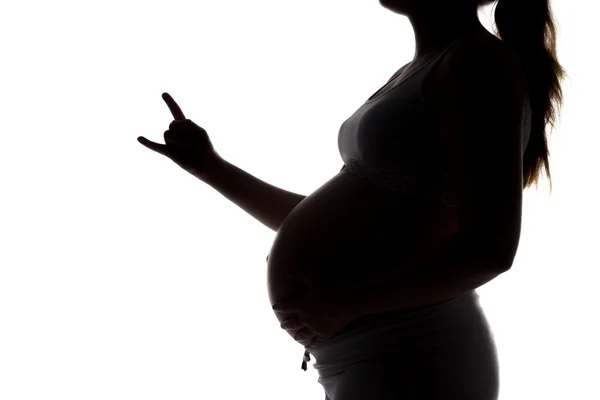 Silhouet van toekomstige moeder weergegeven: vingers — Stockfoto