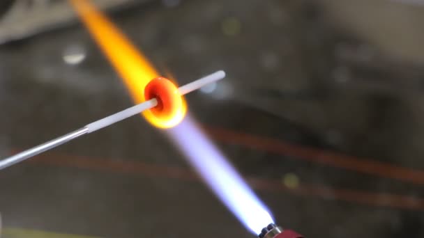 Gas lighter and glass stick, time lapse — Stock Video