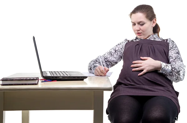 Writing expectant mother in office — Stock Photo, Image