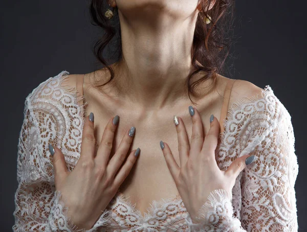 Photo of woman in see-through dress with low neckline — Stock Photo, Image