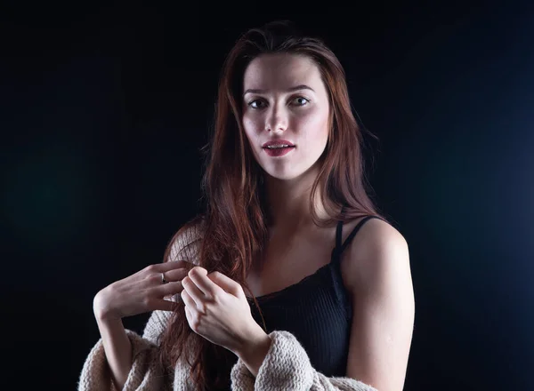 Photo of young girl with long hair in knitted sweater — Stock Photo, Image