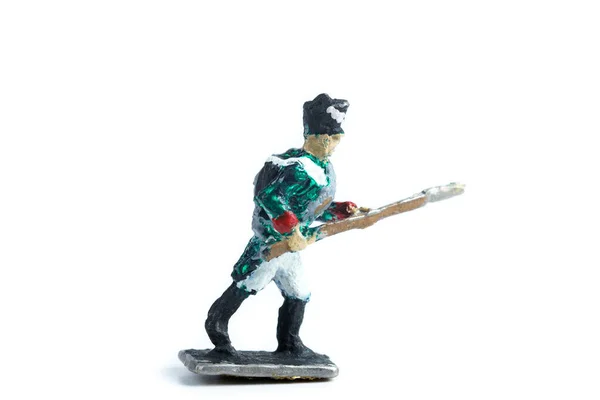 Obrázek vinobraní cínový voják na bílém pozadí — Stock fotografie