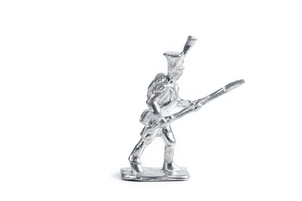 Immagine di un soldato in metallo lavorato a mano su sfondo bianco — Foto Stock