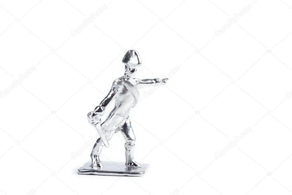 Image of uncolored tin soldiers on the white background