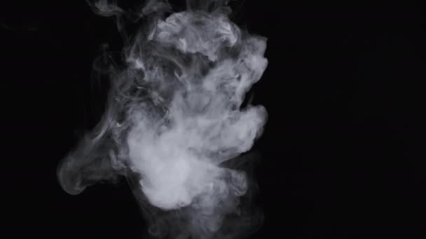 Slow motion footage of cloudy smoke of electronic cigarette — Stock Video