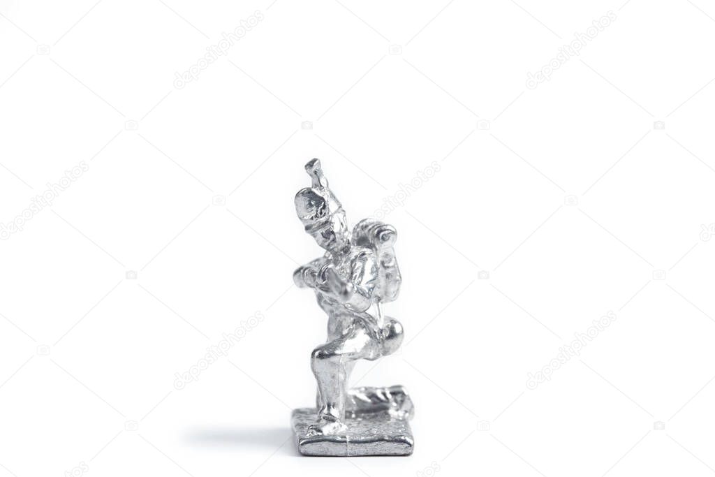 Shot of uncolored metal soldier on the white background