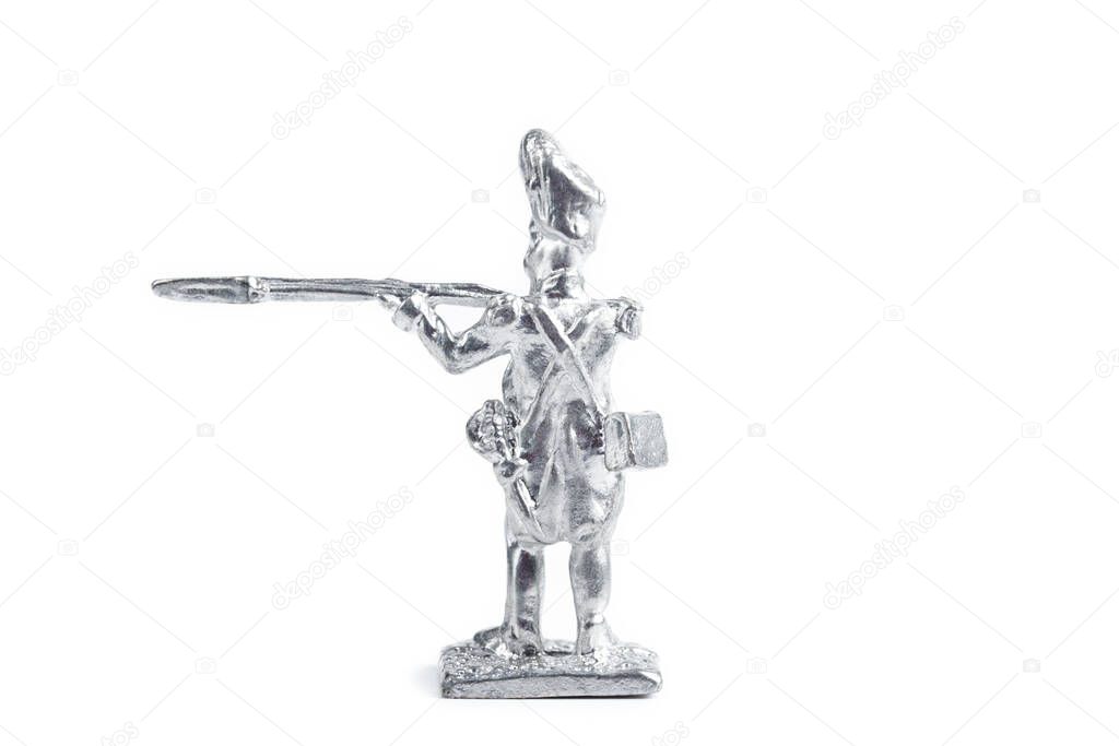 Image of unpainted metal soldier on the white background